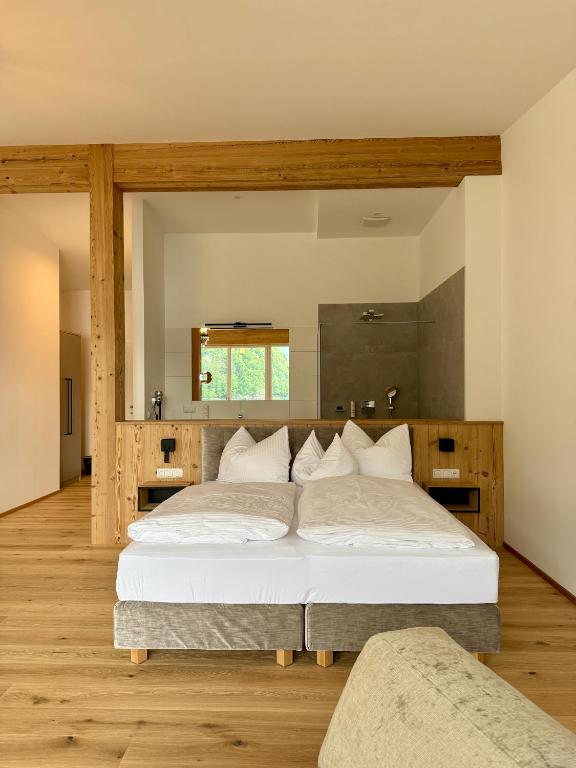 Postel nebo postele na pokoji v ubytování Seehotel Lilly