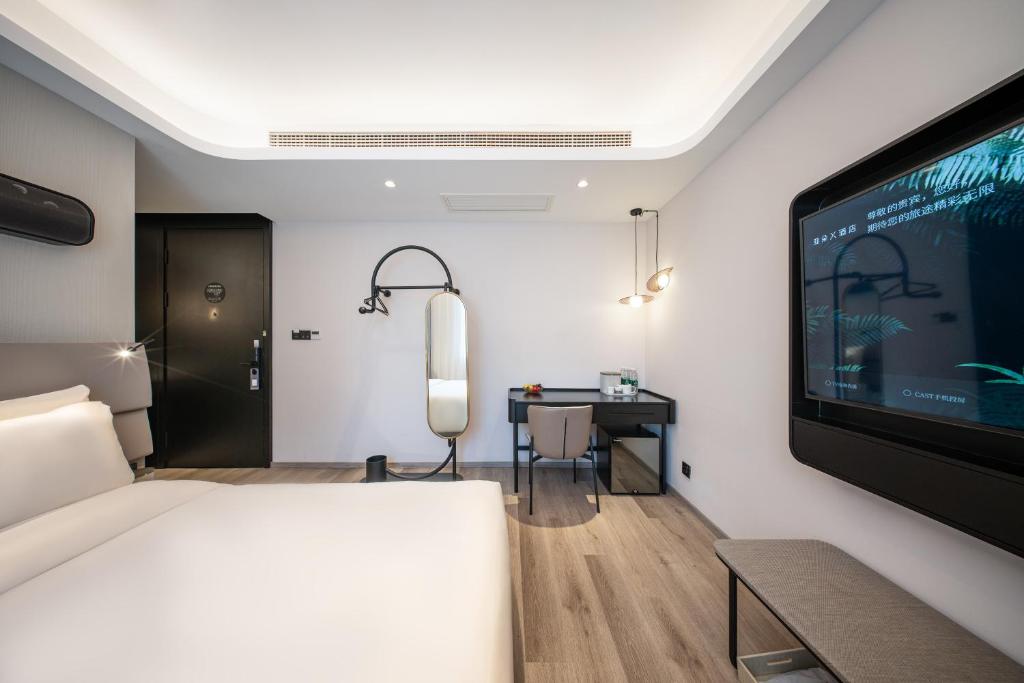 Postel nebo postele na pokoji v ubytování Atour Light Hotel Shanghai Xujiahui Jiaotong University