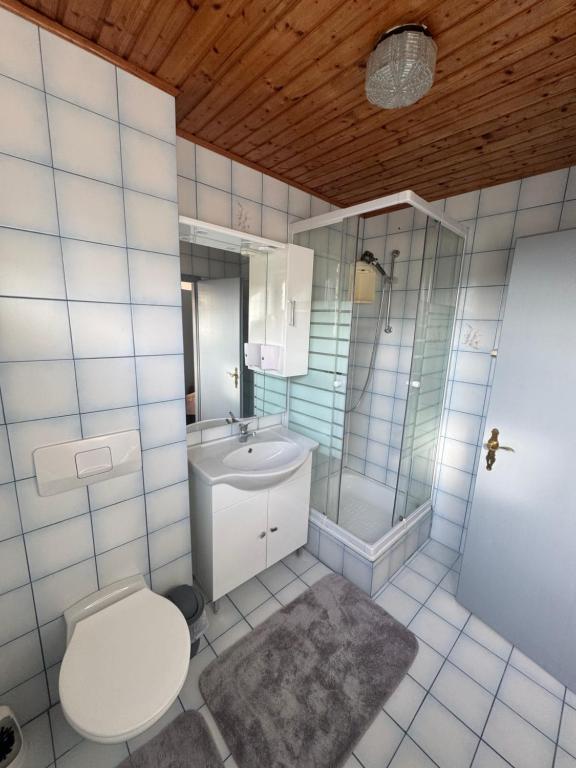 Koupelna v ubytování Guesthouse-Mother