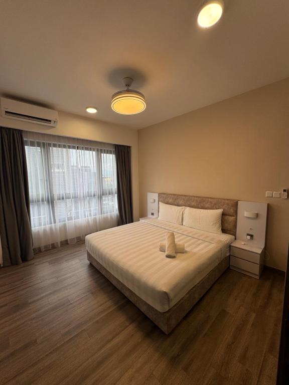 Postel nebo postele na pokoji v ubytování Agile TRX Luxury suite Bukit bintang