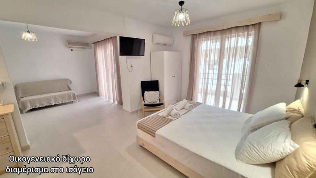 Posteľ alebo postele v izbe v ubytovaní Evita's Resort