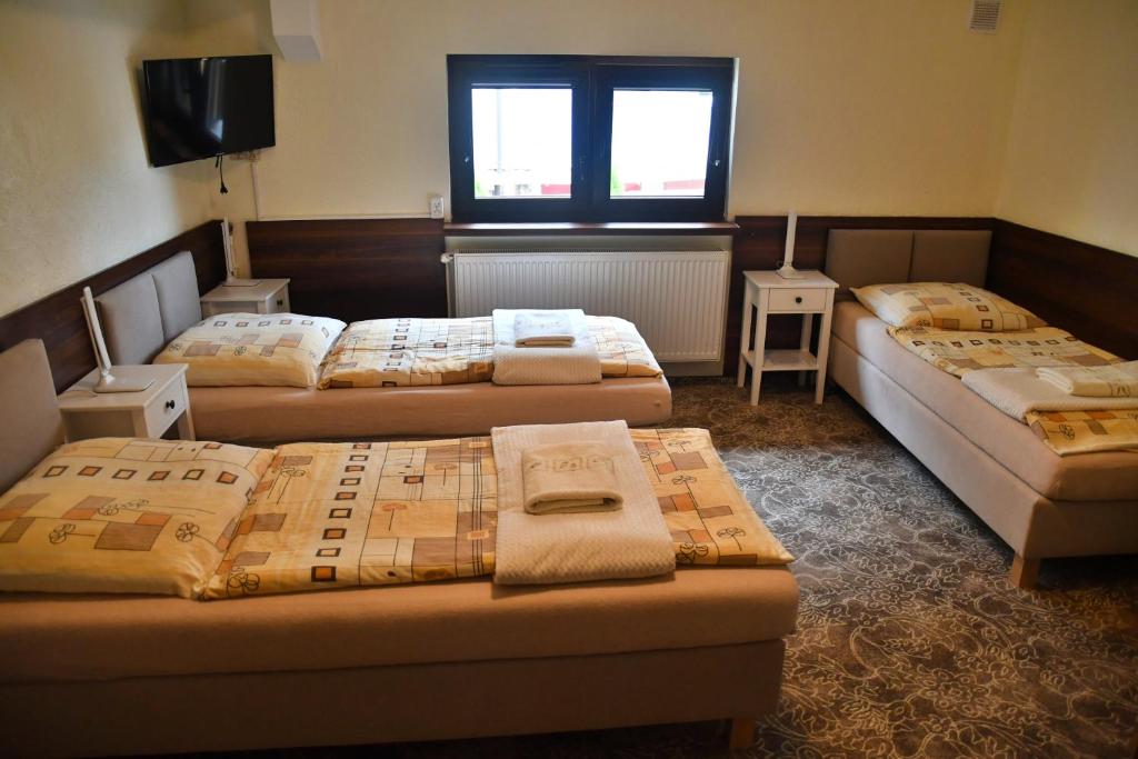 Postel nebo postele na pokoji v ubytování Noclegi