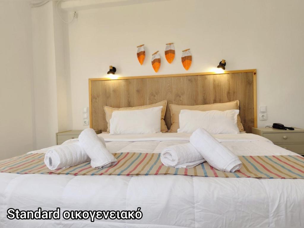Posteľ alebo postele v izbe v ubytovaní Evita's Resort