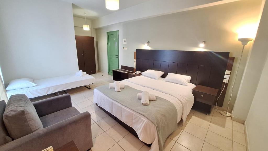 Posteľ alebo postele v izbe v ubytovaní Evita's Resort