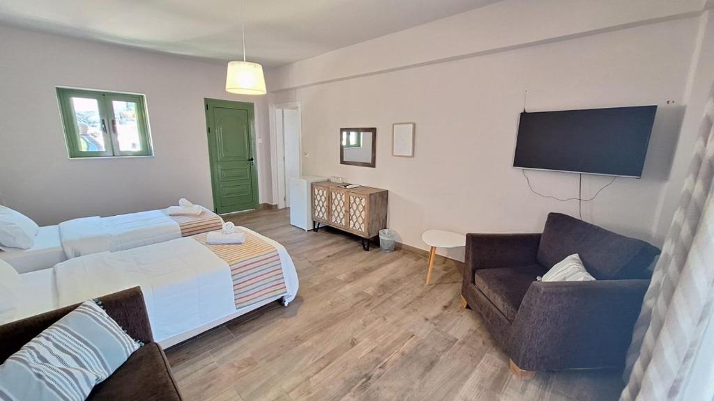 Posteľ alebo postele v izbe v ubytovaní Evita's Resort