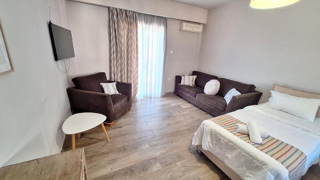 Posteľ alebo postele v izbe v ubytovaní Evita's Resort