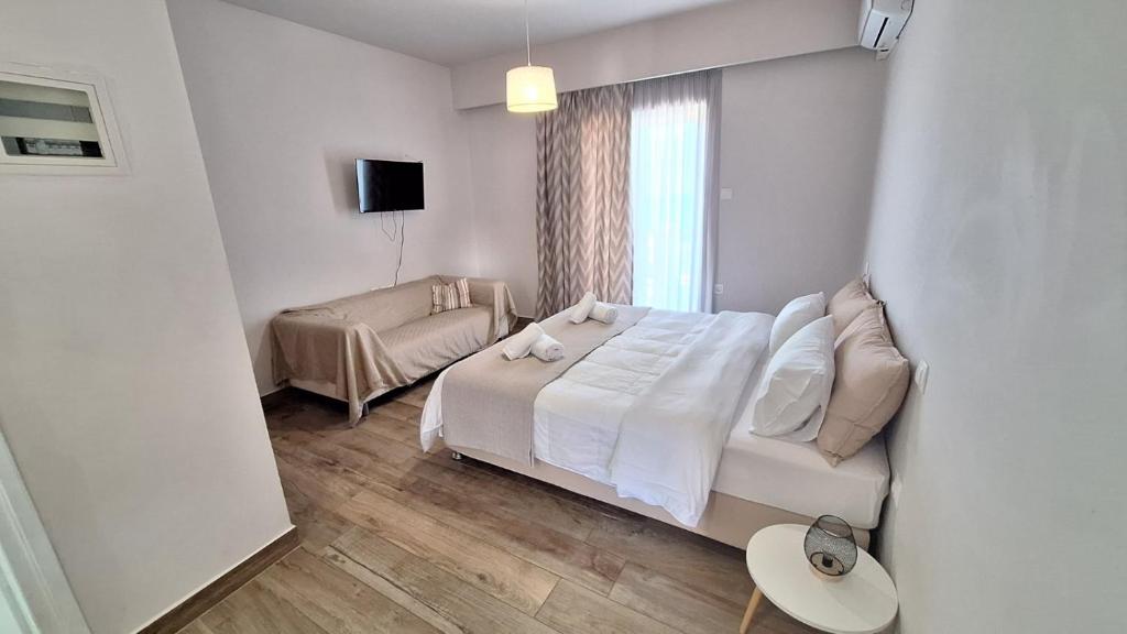 Posteľ alebo postele v izbe v ubytovaní Evita's Resort