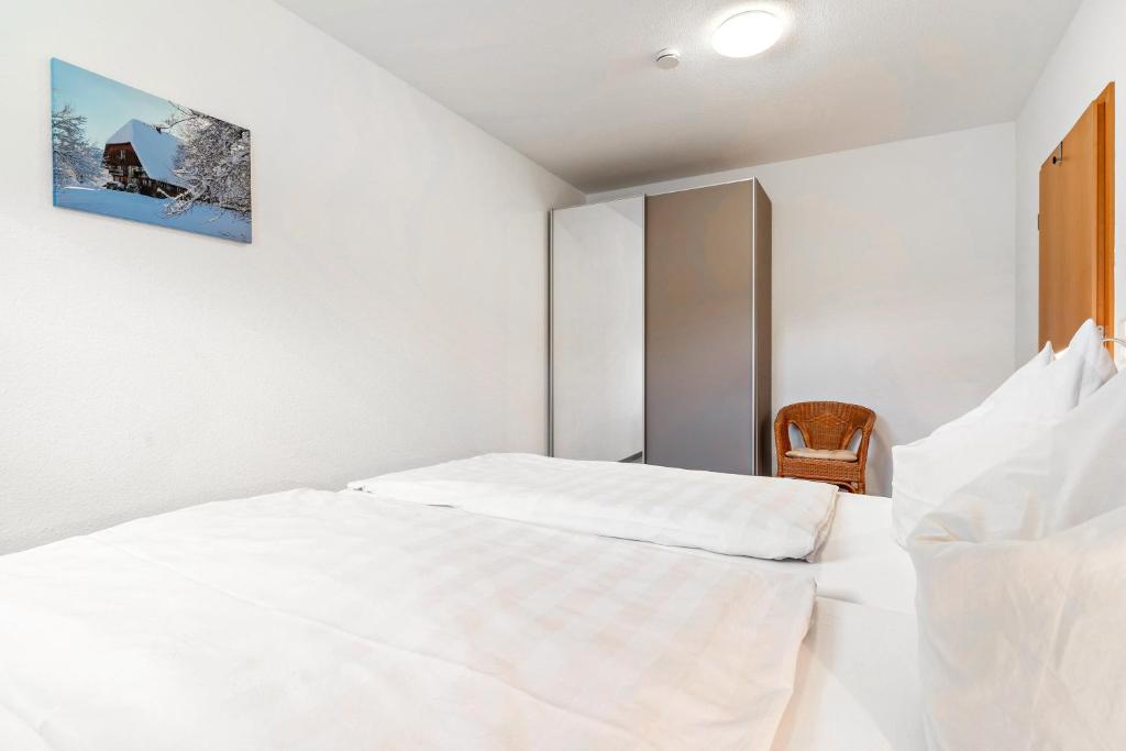 Postel nebo postele na pokoji v ubytování Haus Sum