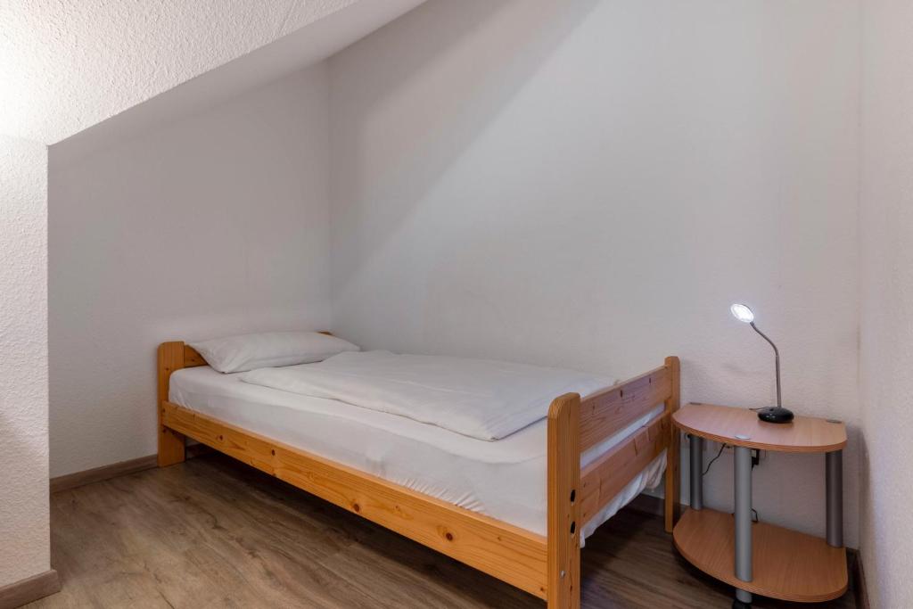 Postel nebo postele na pokoji v ubytování Haus Sum