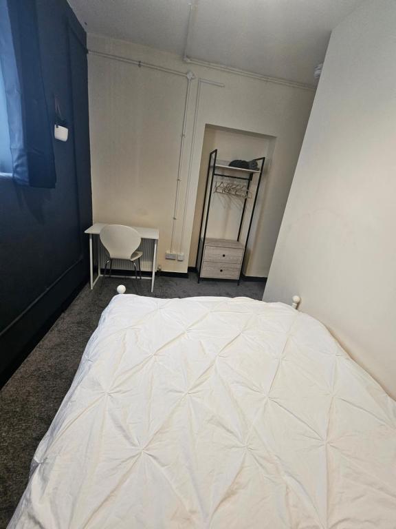 Postel nebo postele na pokoji v ubytování Birkenhead Hostel