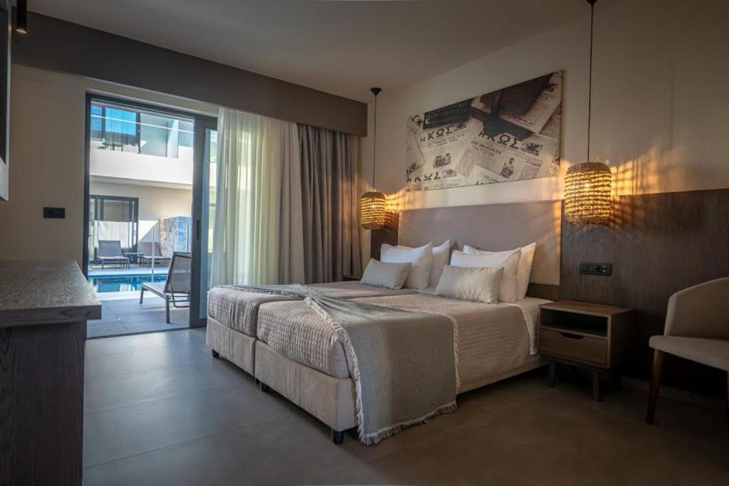 Postel nebo postele na pokoji v ubytování Cosmopolitan Hotel