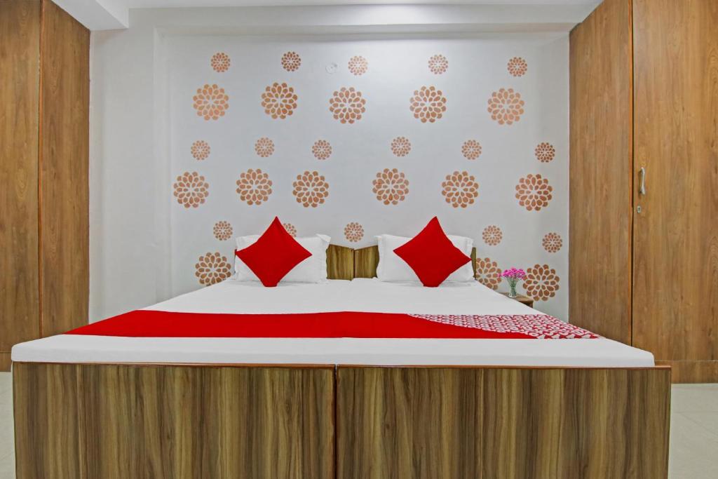 Postel nebo postele na pokoji v ubytování Hotel O Check Inn
