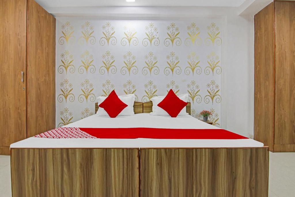Postel nebo postele na pokoji v ubytování Hotel O Check Inn