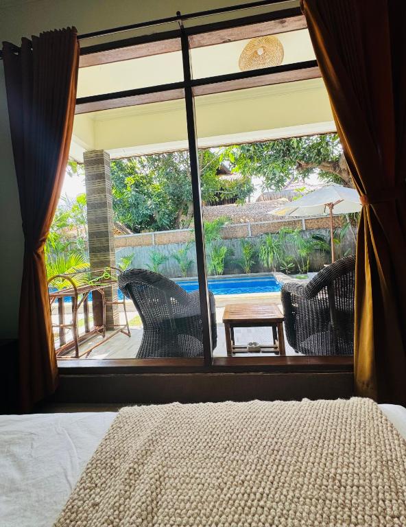 Posezení v ubytování TT House Gili Air