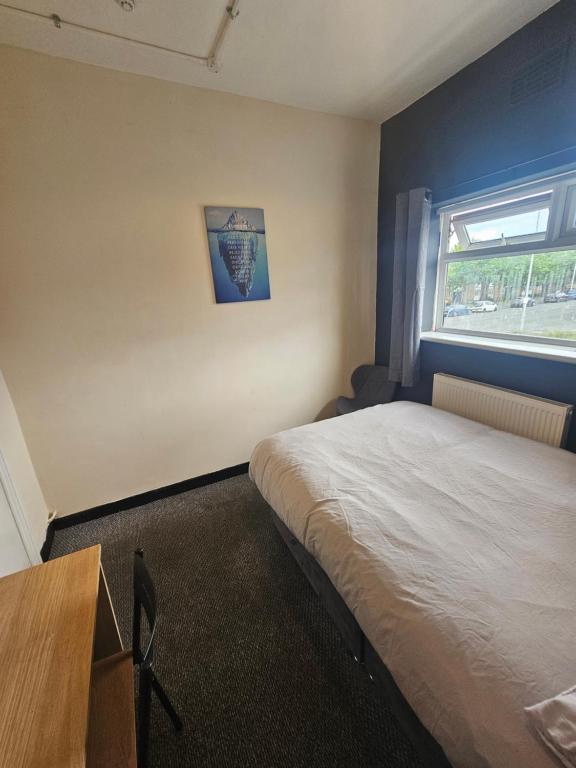 Postel nebo postele na pokoji v ubytování Birkenhead Hostel