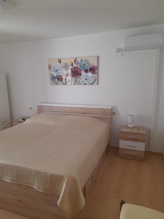 Postel nebo postele na pokoji v ubytování Apartments and Studios Vinko Matić