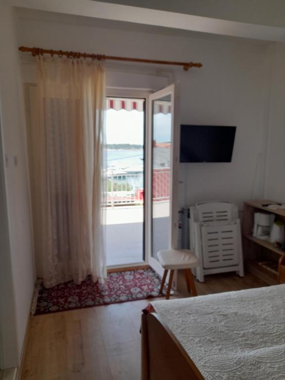 TV a/nebo společenská místnost v ubytování Apartments and Studios Vinko Matić