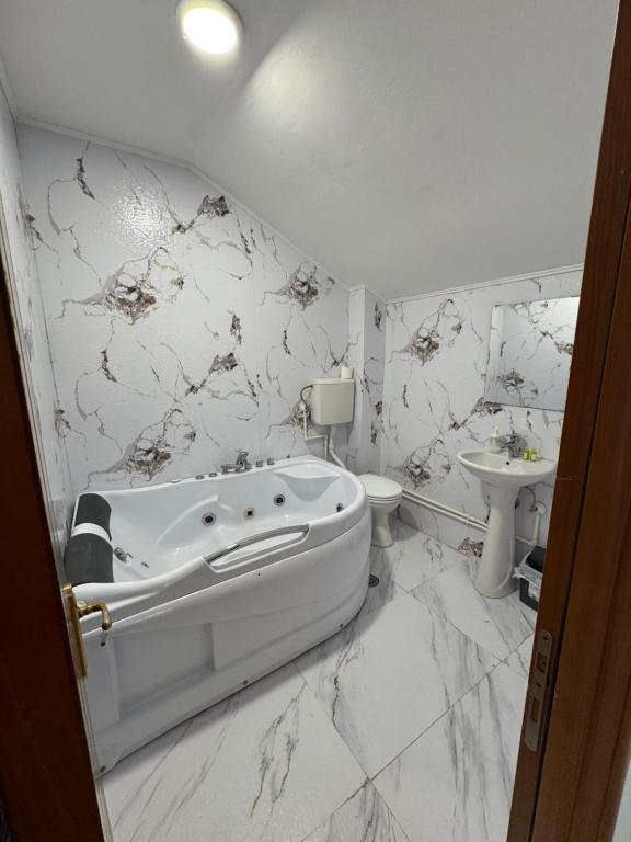 Koupelna v ubytování Hotel Palma