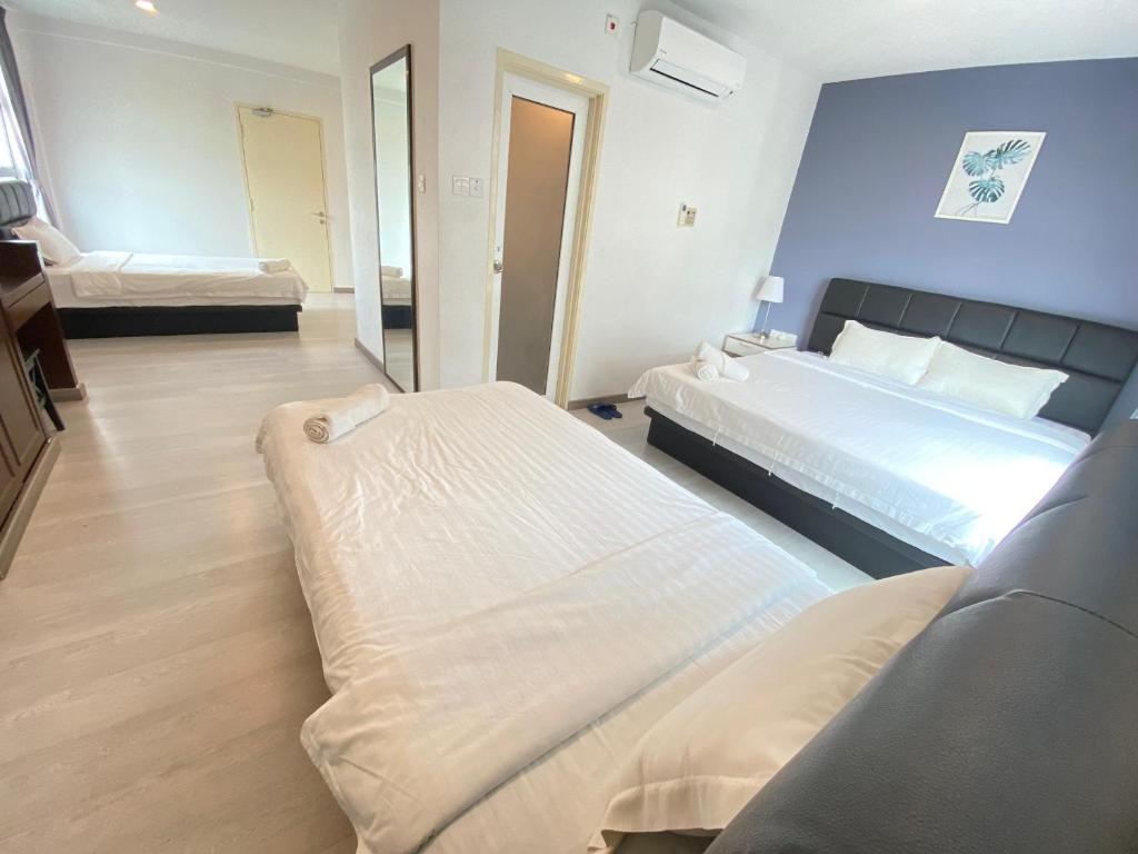 Postel nebo postele na pokoji v ubytování Havona hotel - Taman Tropika Kulai