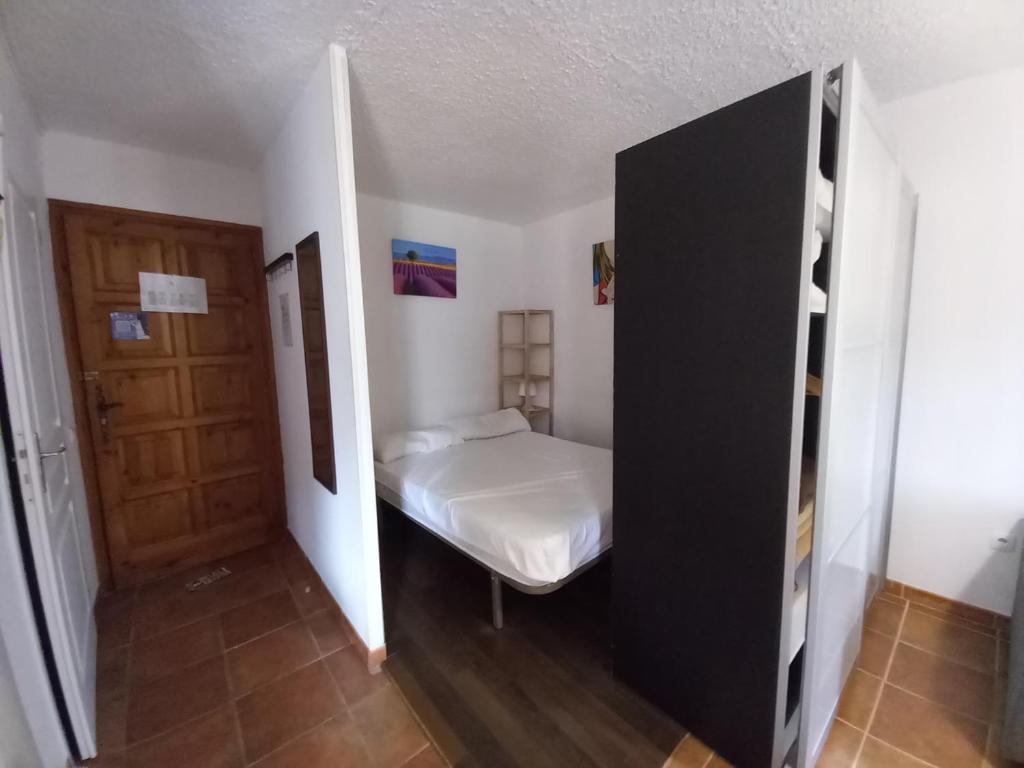 Postel nebo postele na pokoji v ubytování Altissim Nevada II