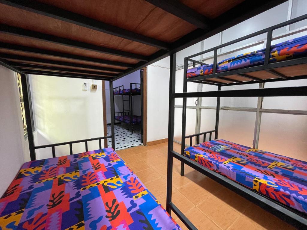 Postel nebo postele na pokoji v ubytování Silva Hostel & Rooms