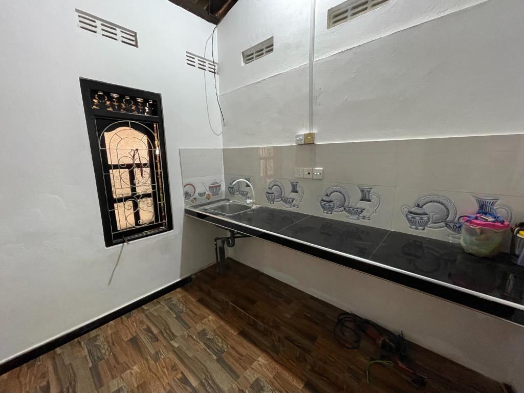 Kuchyň nebo kuchyňský kout v ubytování Silva Hostel & Rooms