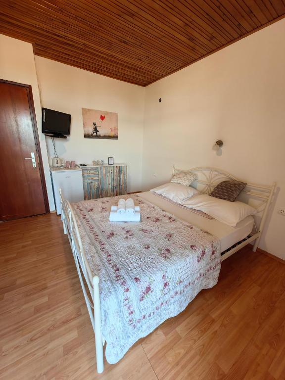 Postel nebo postele na pokoji v ubytování House ŠPILJAR