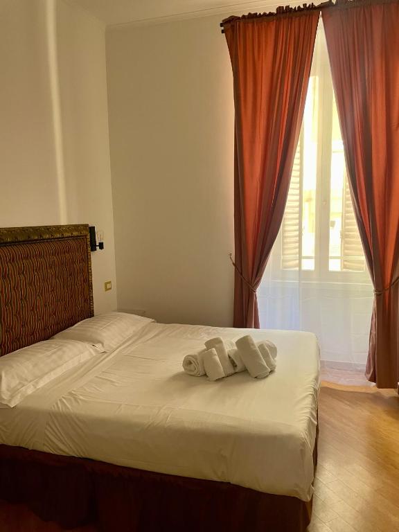 Postel nebo postele na pokoji v ubytování DCBoutiqueHotel