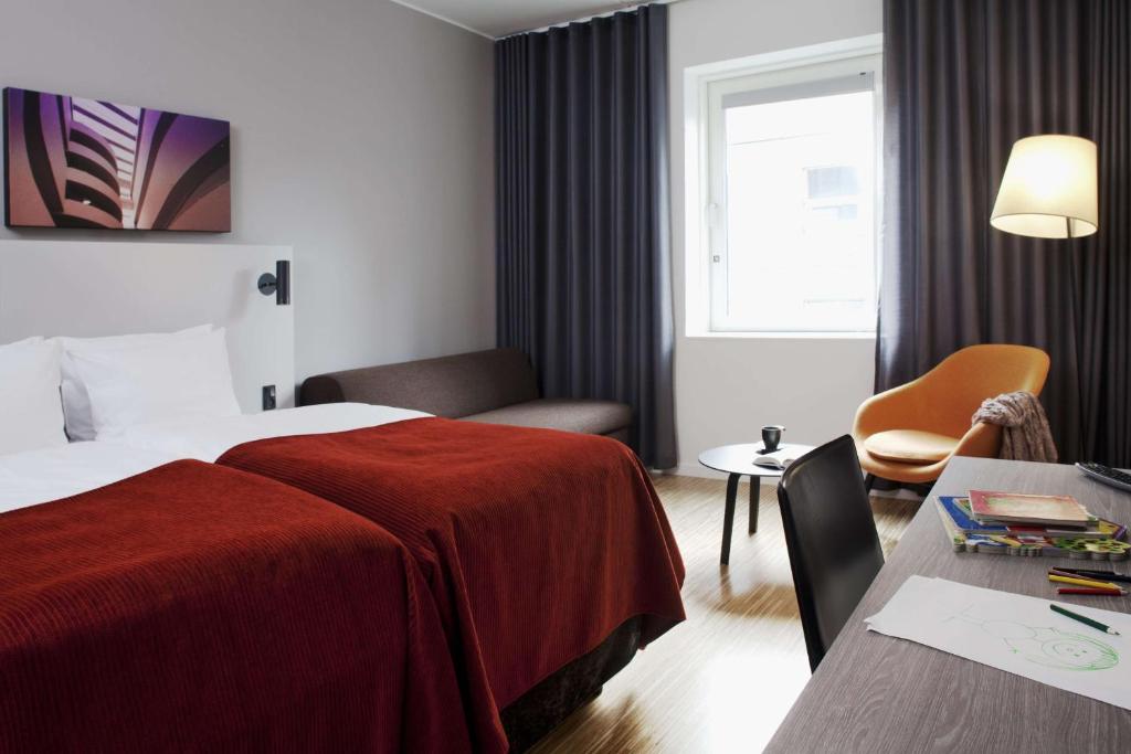 Postel nebo postele na pokoji v ubytování Scandic Aarhus City