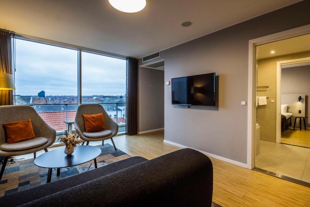 TV a/nebo společenská místnost v ubytování Scandic Aarhus City