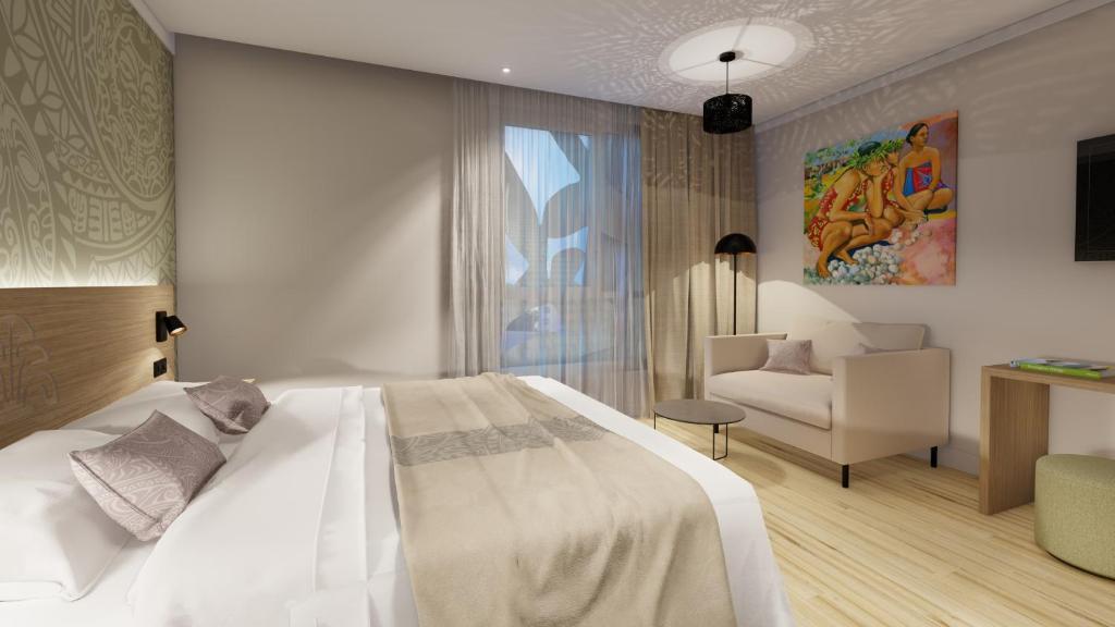 Postel nebo postele na pokoji v ubytování Reva Hotel TAHITI