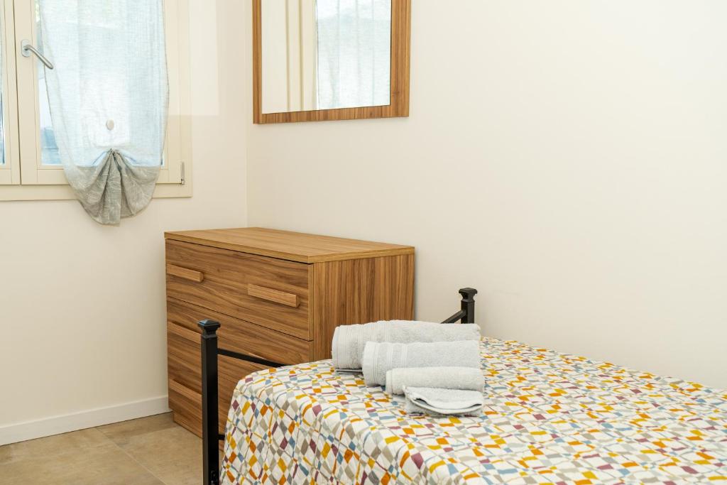 Postel nebo postele na pokoji v ubytování Andrea Lake room