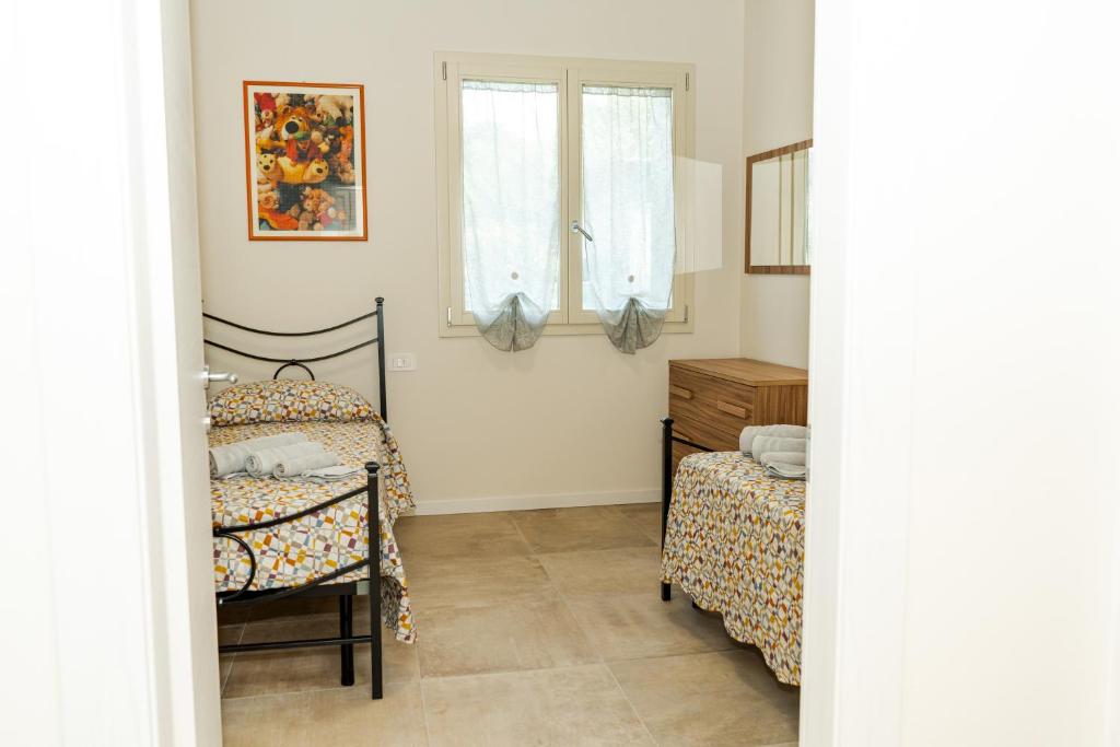 Postel nebo postele na pokoji v ubytování Andrea Lake room