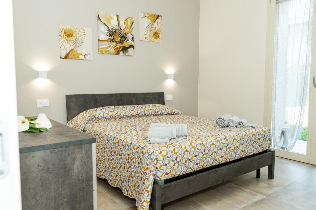 Postel nebo postele na pokoji v ubytování Andrea Lake room