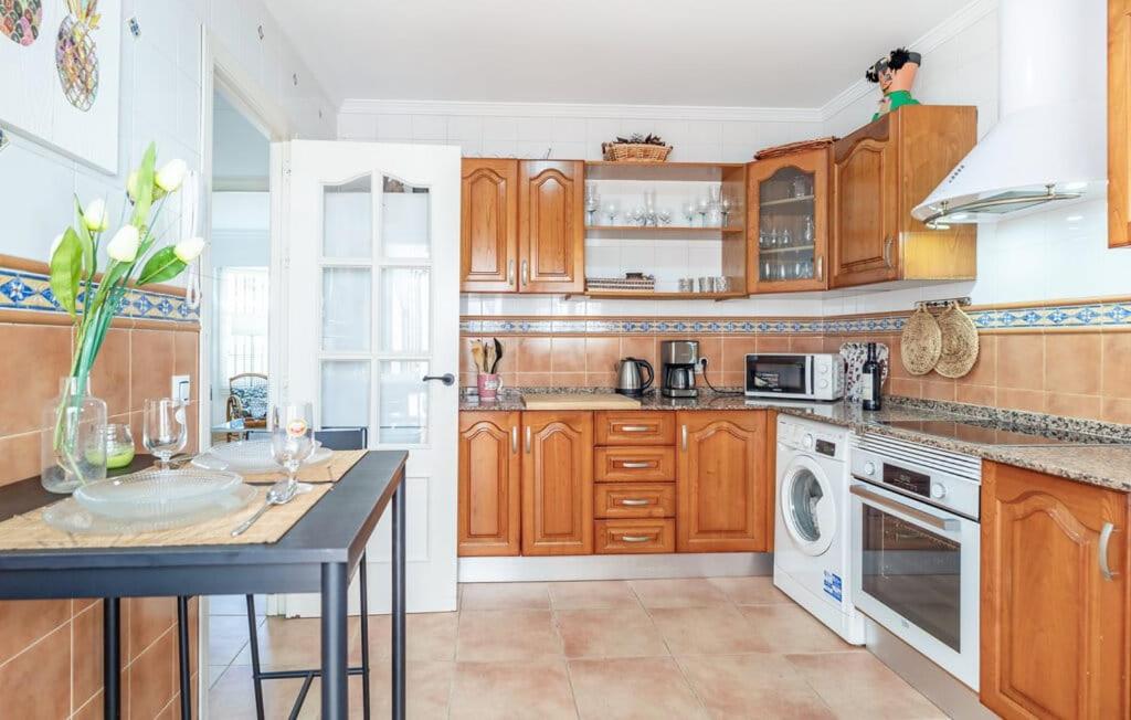 Kuchyň nebo kuchyňský kout v ubytování Villa Lolera