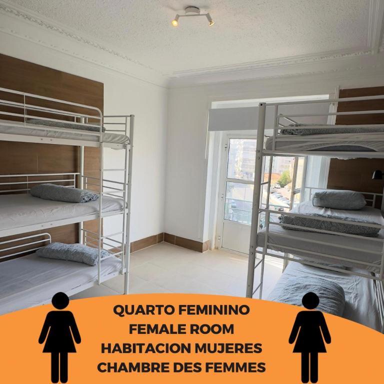 Postel nebo postele na pokoji v ubytování Samps Hostel