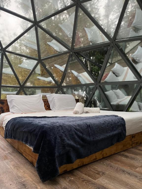 Postel nebo postele na pokoji v ubytování Quinta do Abacate - Glamping Park