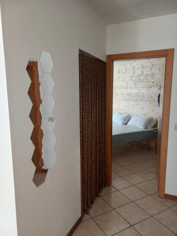 Postel nebo postele na pokoji v ubytování La finestra sul Brenta