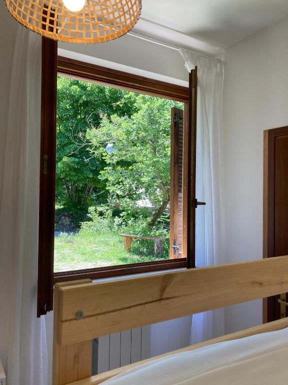 Postel nebo postele na pokoji v ubytování Dimore Montane
