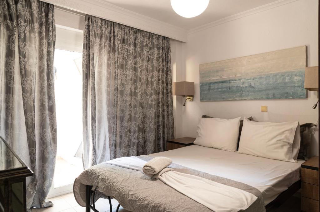Ένα ή περισσότερα κρεβάτια σε δωμάτιο στο Silot apartment 2