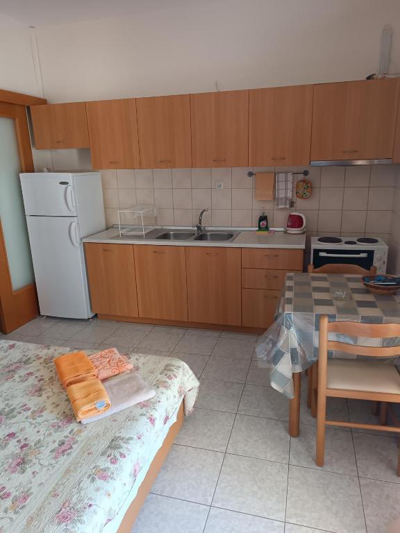 Kuchyň nebo kuchyňský kout v ubytování Anestis Apartments & rooms
