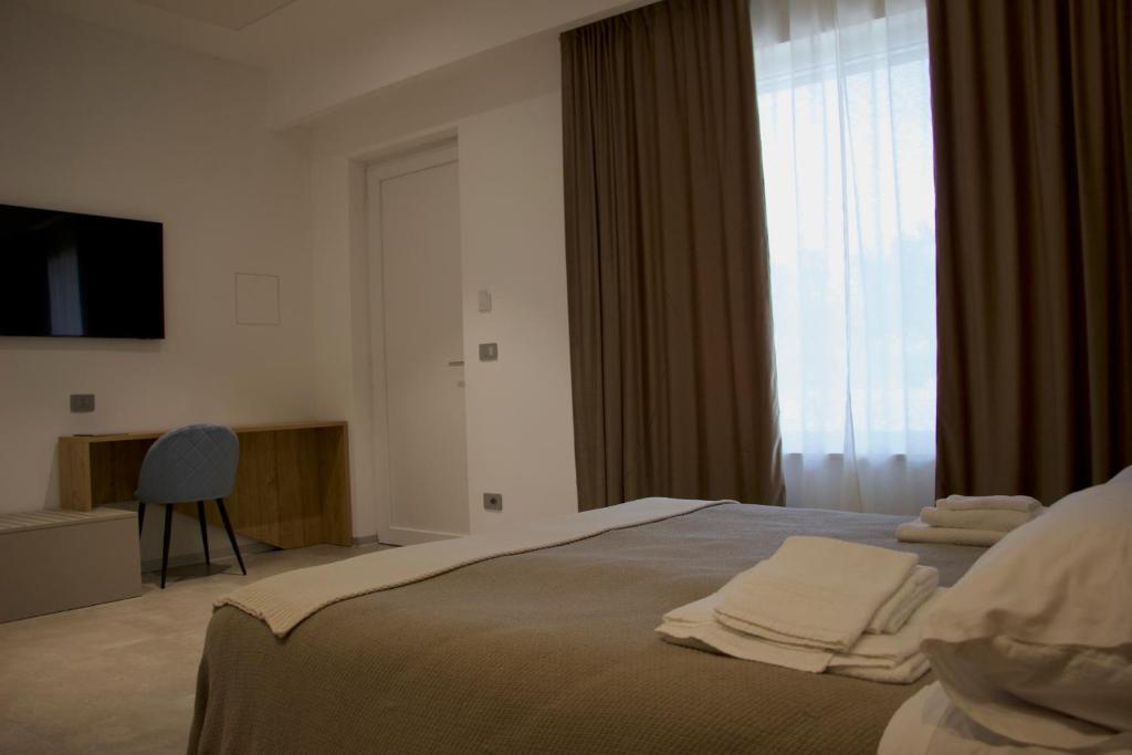 Postel nebo postele na pokoji v ubytování Masseria Stella