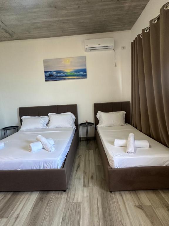 Postel nebo postele na pokoji v ubytování Aloha Villa and Suites