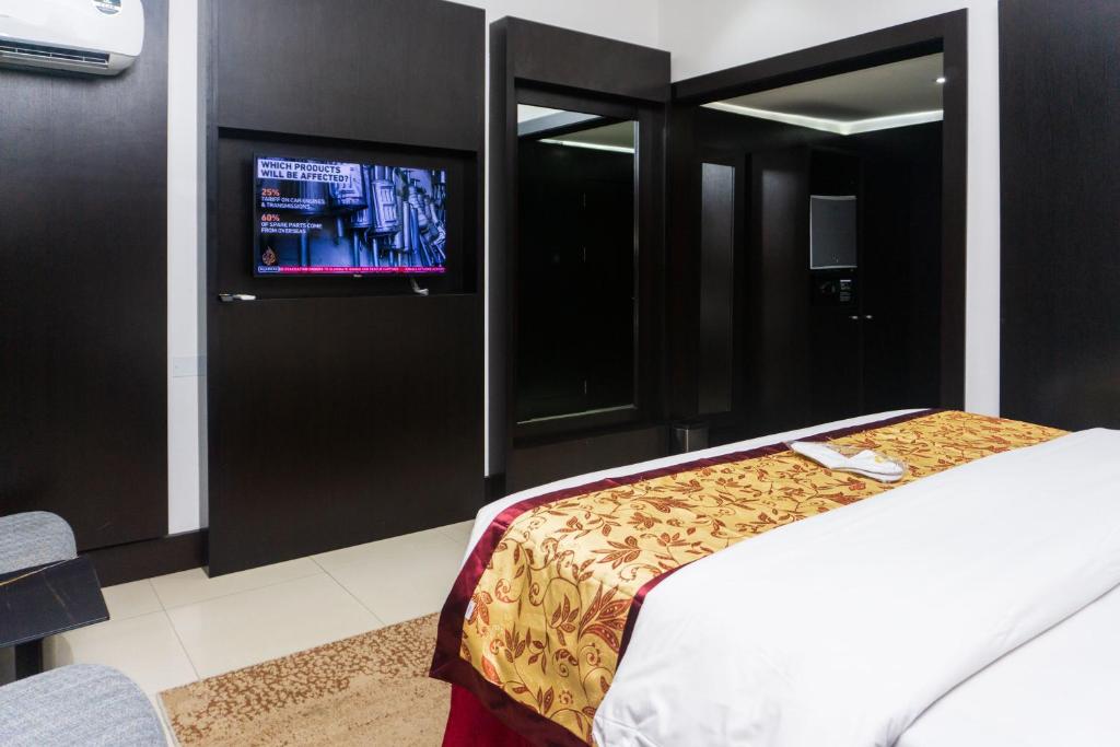 Postel nebo postele na pokoji v ubytování GreenPoint Hotel