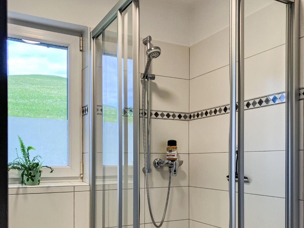 Koupelna v ubytování Holiday Home Mayrhofer by Interhome