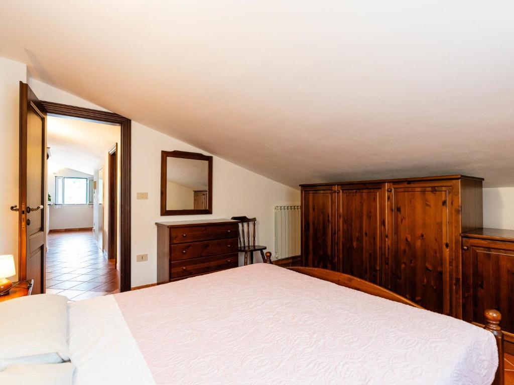 Posteľ alebo postele v izbe v ubytovaní Apartment La Colombera E by Interhome