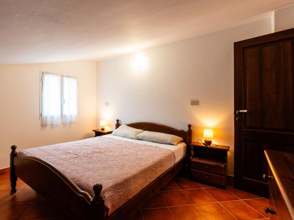 Posteľ alebo postele v izbe v ubytovaní Apartment La Colombera E by Interhome
