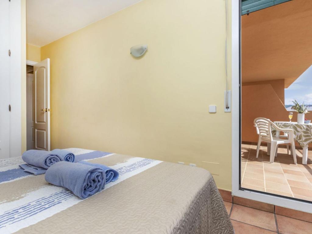 Postel nebo postele na pokoji v ubytování Apartment Port Pals FIII by Interhome