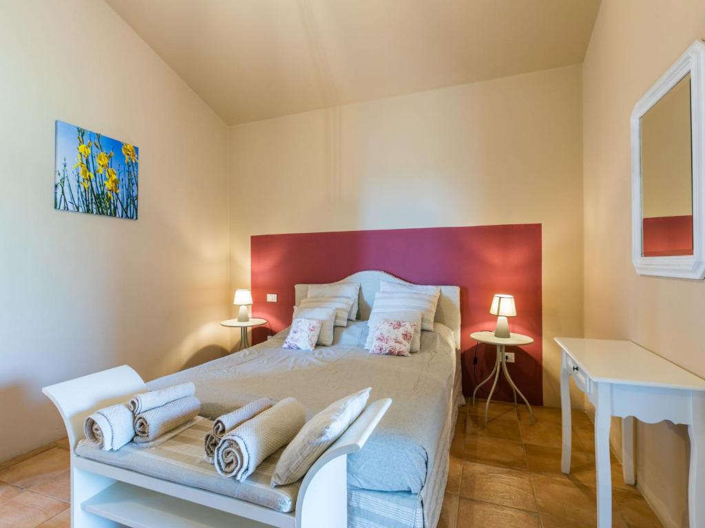 Łóżko lub łóżka w pokoju w obiekcie Holiday Home Il Fienile by Interhome