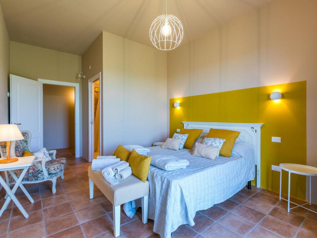 Łóżko lub łóżka w pokoju w obiekcie Holiday Home Il Fienile by Interhome
